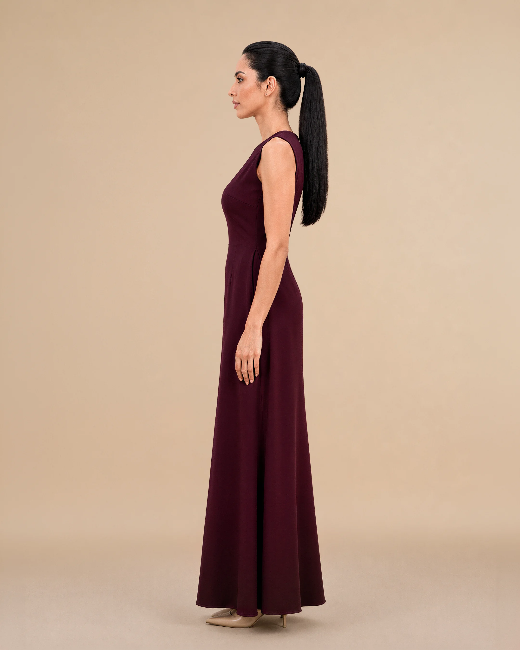 Covent Garden Long Dress luxury dress in Burgundy, side view. Bint Saeed Abu Dhabi, UAE.