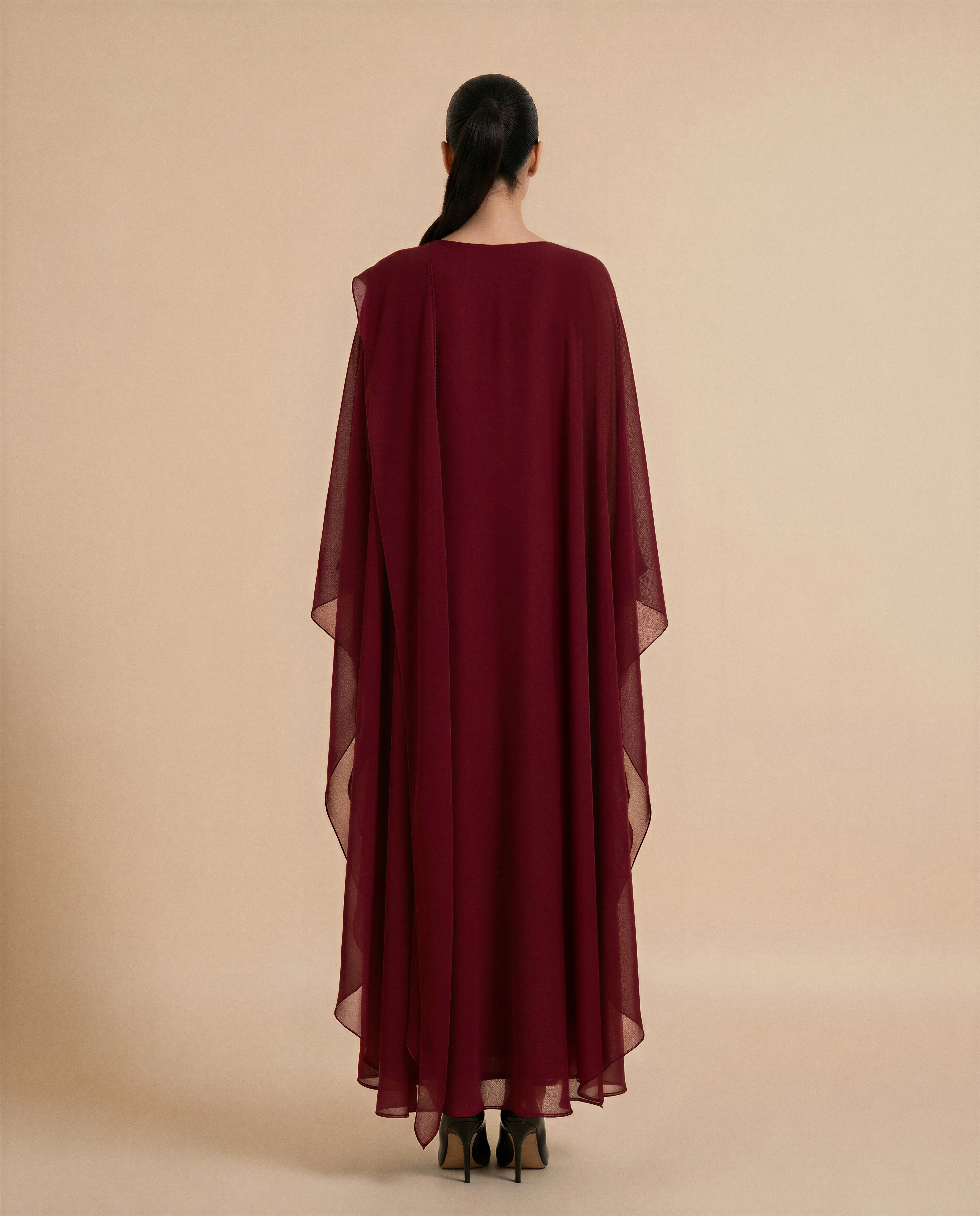 Mayfair Kaftan luxury kaftan in Dark Maroon, back view. Bint Saeed Abu Dhabi, UAE.