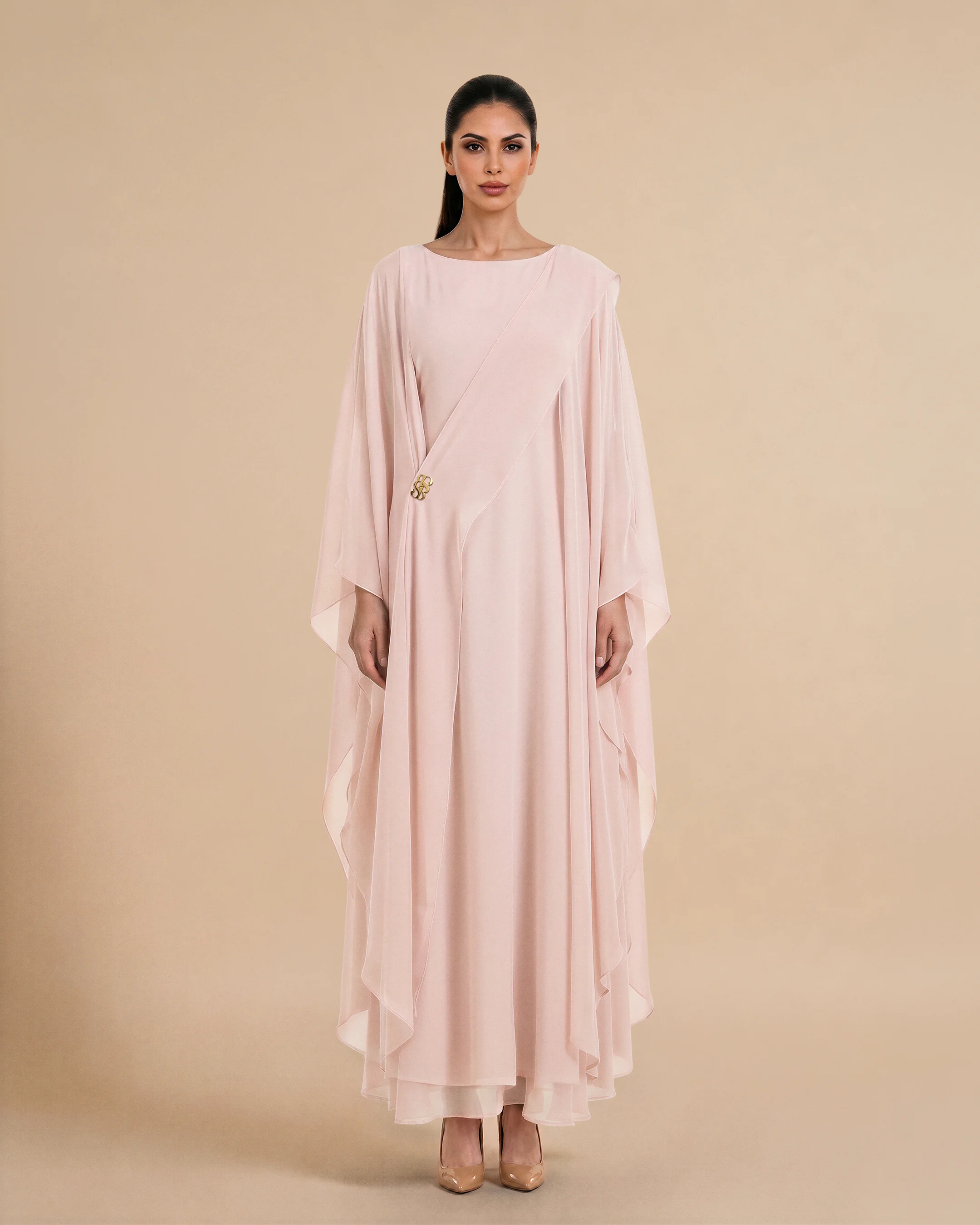 Nothing Hill Kaftan luxury kaftan in Peach Pink, front view. Bint Saeed Abu Dhabi, UAE.