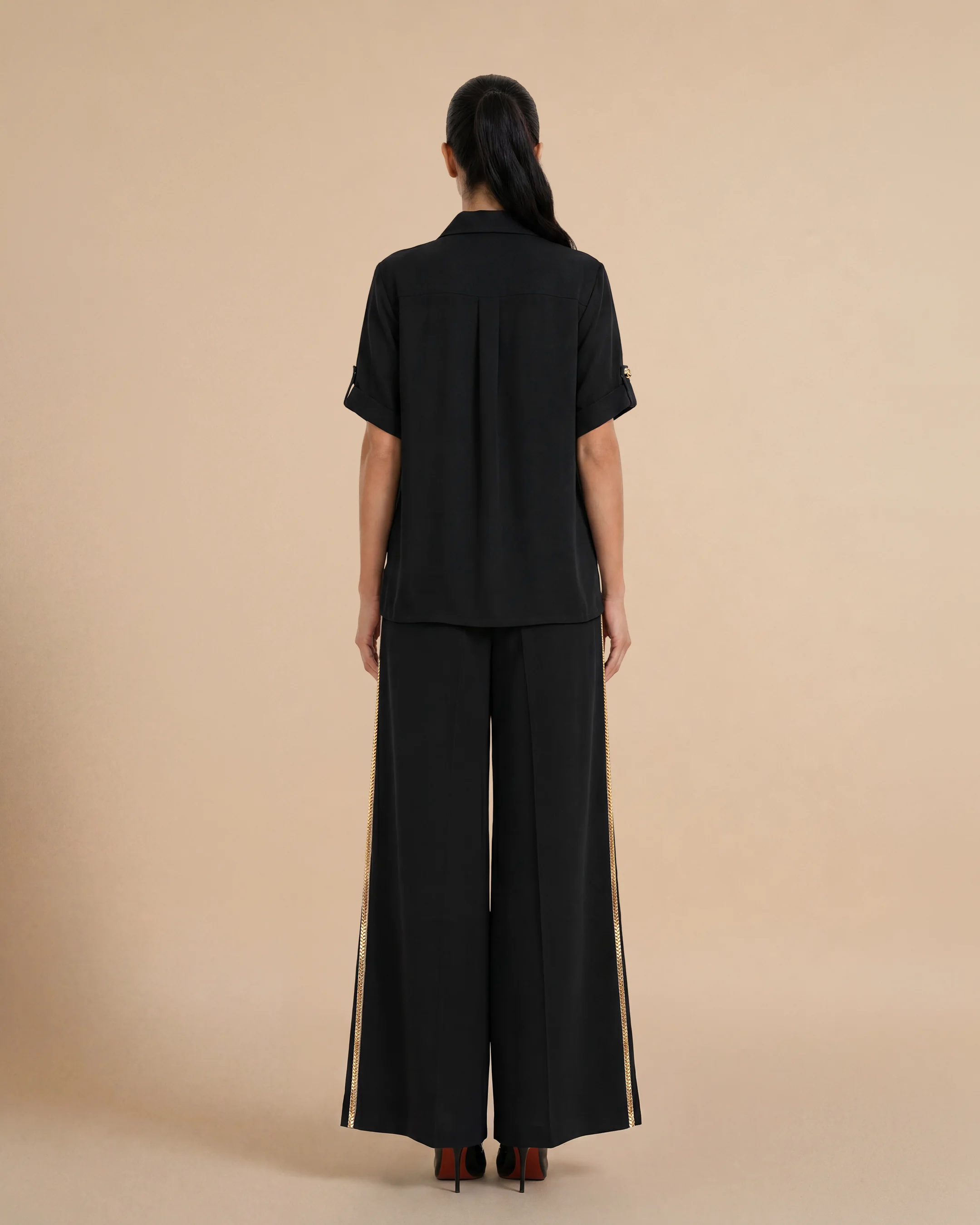 Soho Set luxury set in Black, back view, traditional Al Talli trim celebrating Emirati heritage and Abu Dhabi culture. Bint Saeed Abu Dhabi, UAE.