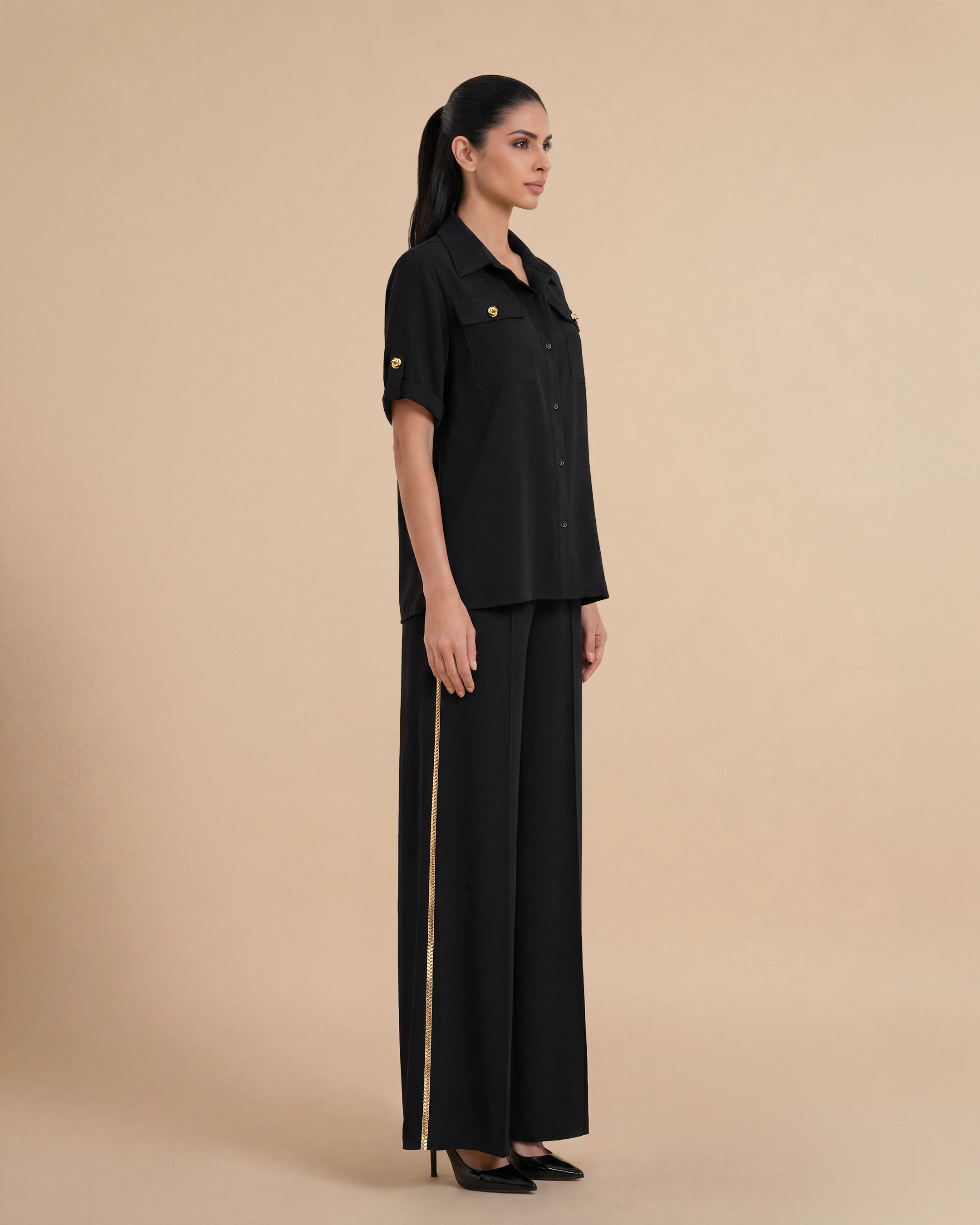 Soho Set luxury set in Black, side view, traditional Al Talli trim celebrating Emirati heritage and Abu Dhabi culture. Bint Saeed Abu Dhabi, UAE.