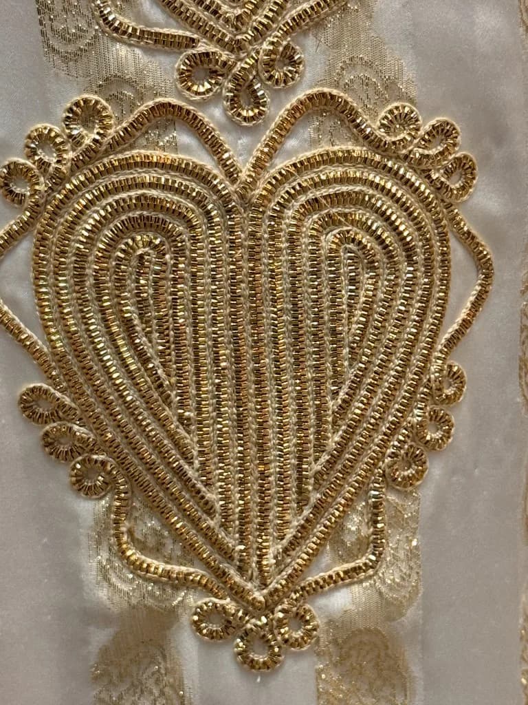 Al Talli metallic thread embroidery. Bint Saeed Abu Dhabi, United Arab Emirates.