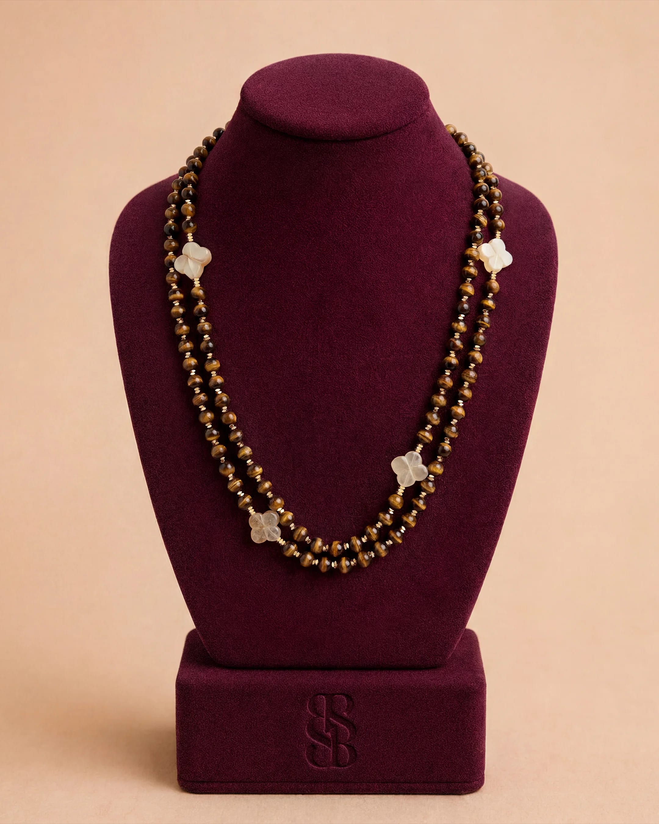 Al Ain Oasis Necklace - Tiger Eye by Bint Saeed: natural tiger eye stone beads with subtle chatoyancy, Carnelian Al Ain Rosette and 18K gold-plated signature clasp — handcrafted bead necklace in Abu Dhabi, United Arab Emirates. Worldwide shipping. Bint Saeed Abu Dhabi, United Arab Emirates.