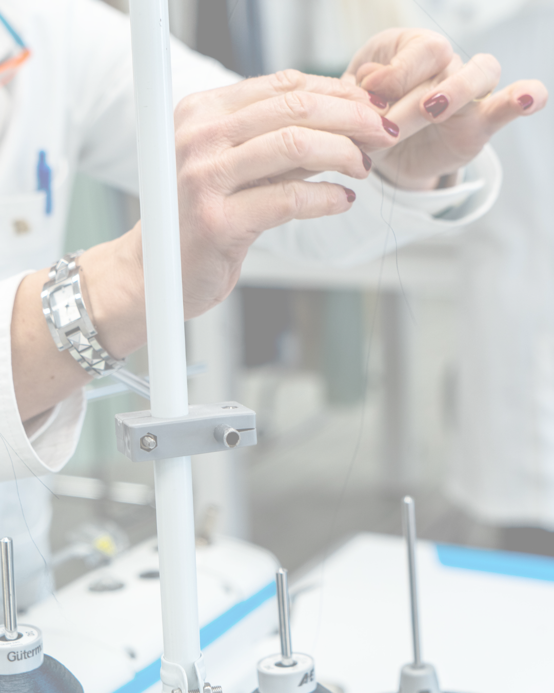 Bint Saeed luxury textile and fabric selection for bespoke abayas—evaluating drape, weight, and performance during development in Abu Dhabi